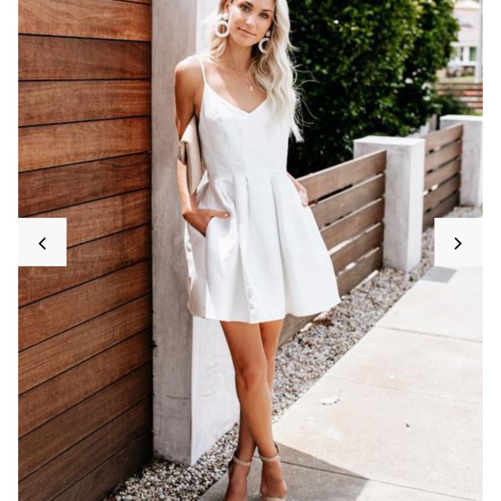 Vici white supermodel dress with pockets. NWT